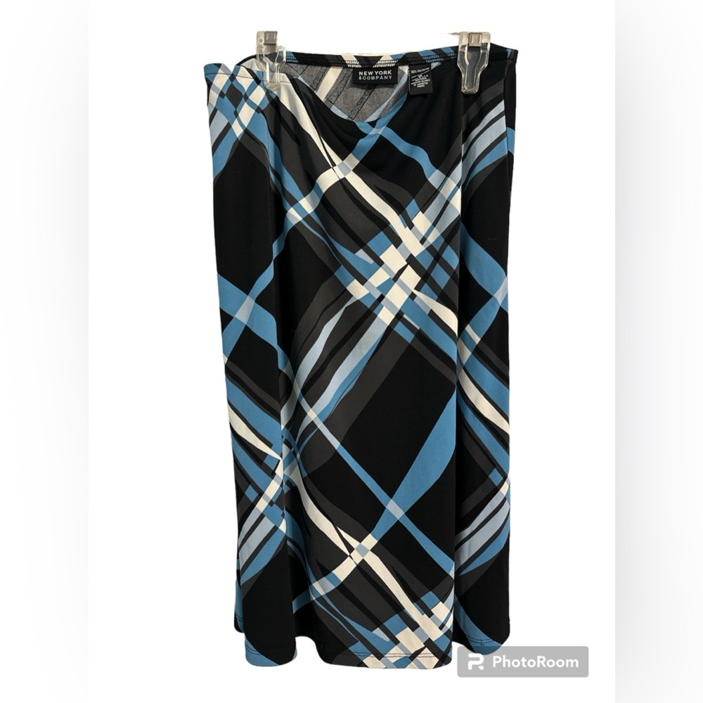 New York and Company. A lone blue, black, white & gray plaid skirt. Size Medium